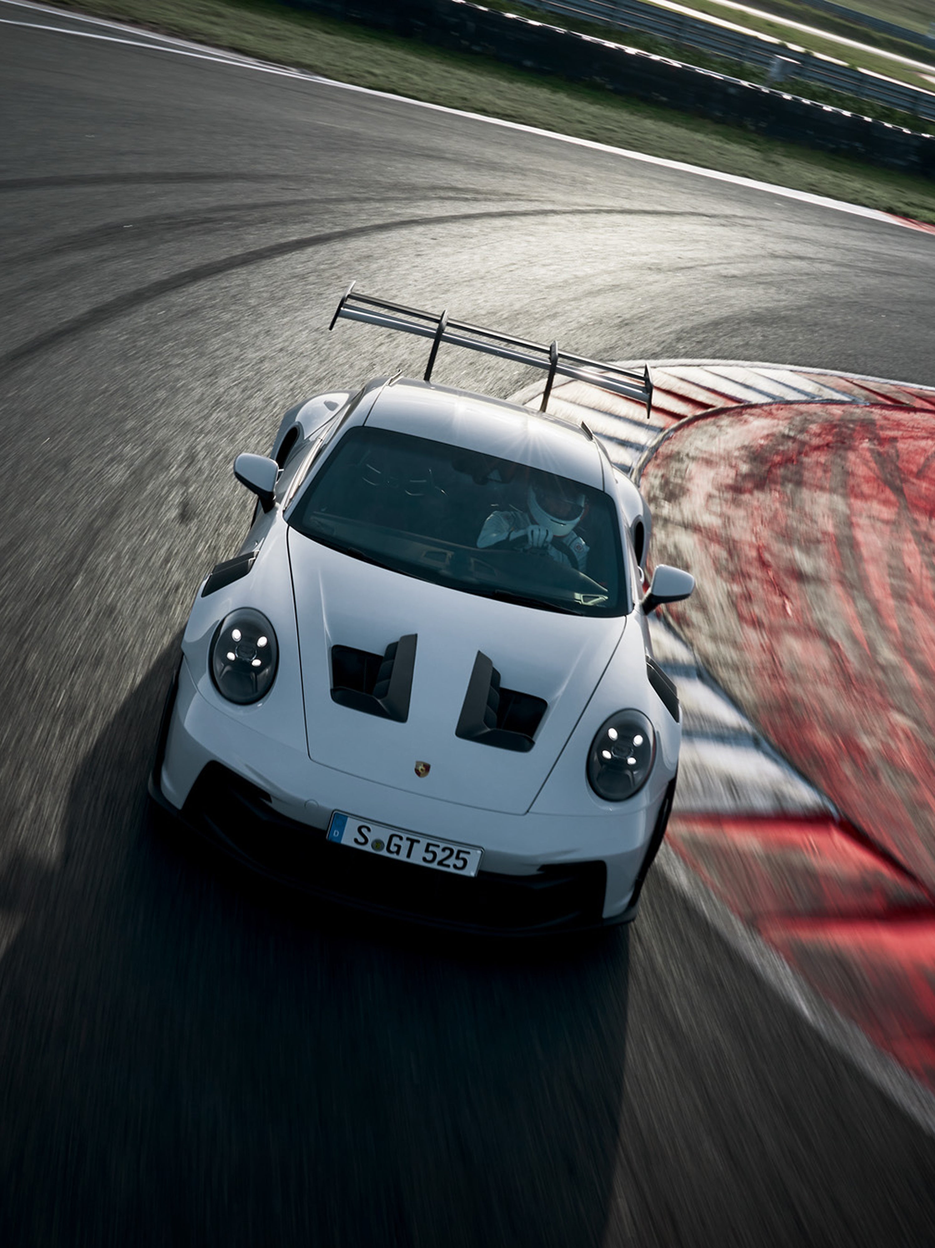 Driver detail inside a GT3RS cockpit